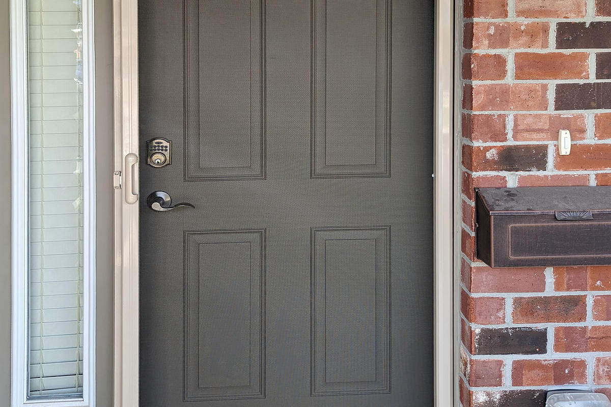 Mirage retractable screen door installation by Dann's Screens and More in and around London, Ontario and Lucan region