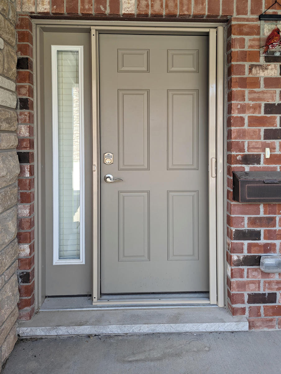 Mirage retractable screen door installation by Dann's Screens and More in and around London, Ontario and Lucan region