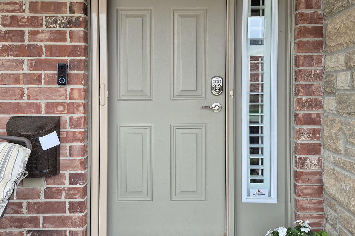 Mirage retractable screen door installation by Dann's Screens and More in and around London, Ontario and Lucan region