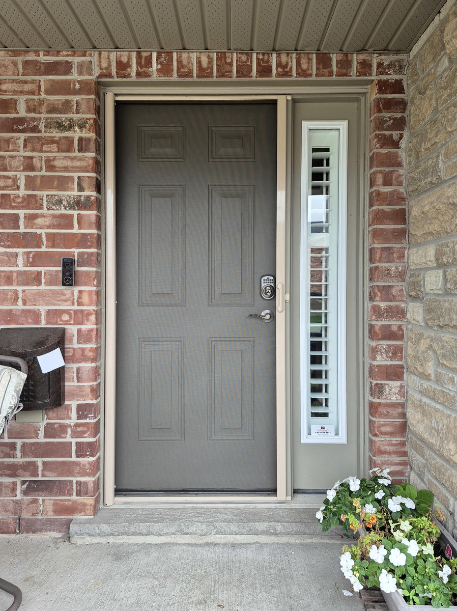 Mirage retractable screen door installation by Dann's Screens and More in and around London, Ontario and Lucan region