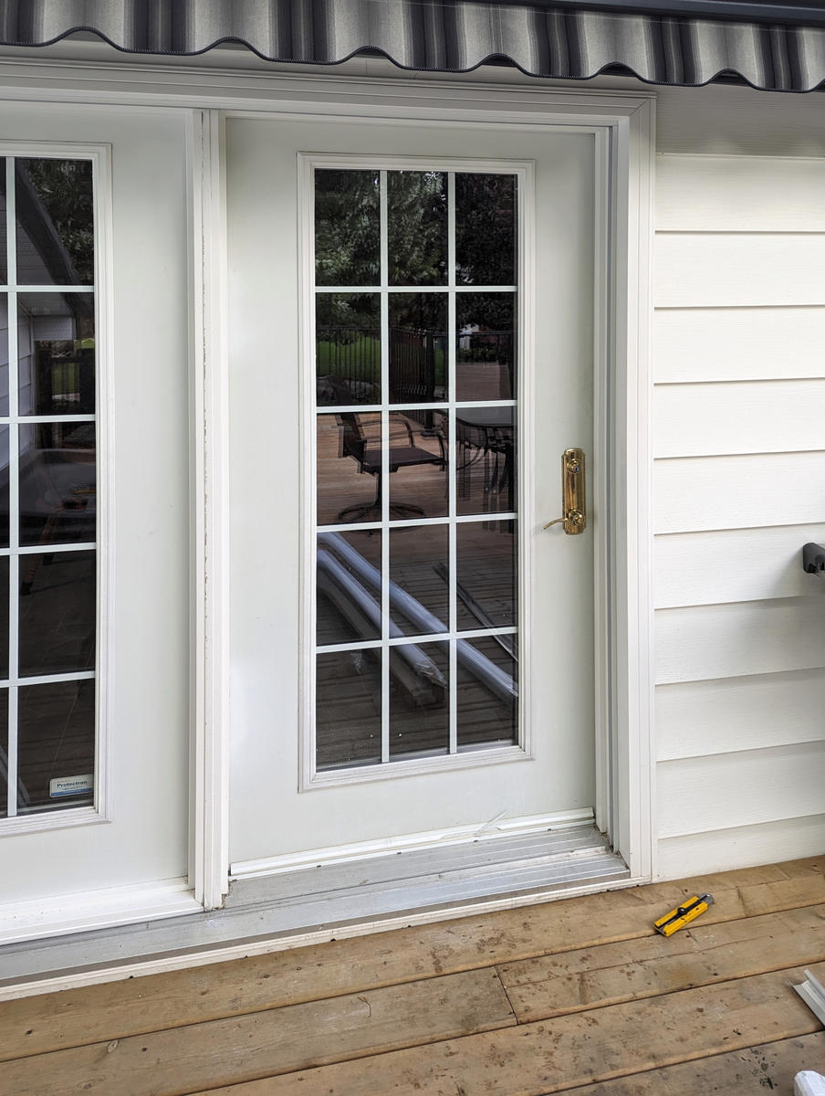 Mirage retractable screen door installation by Dann's Screens and More in and around London, Ontario and Lucan region