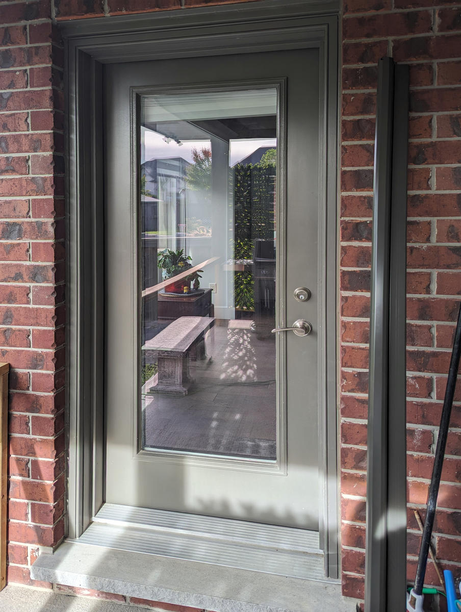 Mirage retractable screen door installation by Dann's Screens and More in and around London, Ontario and Lucan region